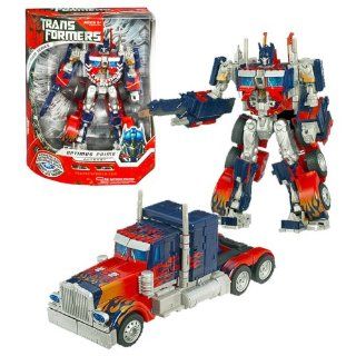 Hasbro Year 2007 Transformers Movie PREMIUM Series Leader Class 9 Inch Tall Robot Action Figure   Autobot Leader OPTIMUS PRIME with Super Detailed Deco, Lights and Sounds Plus Automorph Energy Sword Extends From Arm (Vehicle Mode: Rig Truck): Toys & Ga