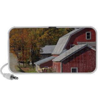 Road beside classic rural barn/farm in autumn, notebook speaker