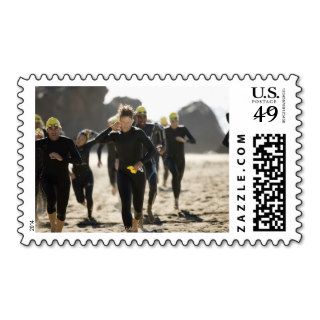 Triathletes Running Along Beach 2 Stamps