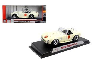 1965 SHELBY COBRA 427 S/C #11 ELVIS PRESLEY in CREAM by Shelby Collectibles in 1:18 Scale: Toys & Games