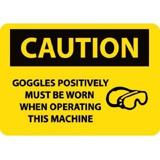 NMC C503AB OSHA Sign, Legend "CAUTION   GOGGLES POSITIVELY MUST BE WORN WHEN OPERATING THIS MACHINE" with Graphic, 14" Length x 10" Height, Aluminum, Black on Yellow: Industrial Warning Signs: Industrial & Scientific