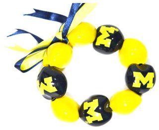 NCAA Michigan Wolverines Go Nuts Kukui Nut Bracelet  Sports Fan Bracelets  Sports & Outdoors