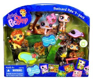 Hasbro Littlest Pet Shop Postcard Pets 3 Pack Bobble Head Pets Figure Set   Lion (#944) with Crown and Pond; Ostrich (#945) with Binoculars and Hat; and Monkey (#946) with Bench and Banana Plus Postcards Featuring the Pets: Toys & Games