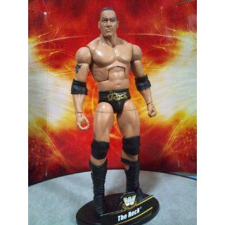 Wwe Legends Rock Collector Figure: Toys & Games
