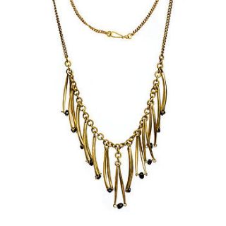 gold swing necklace by tuli storm