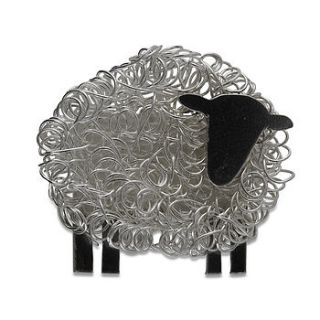 silver sheep brooch facing right by am jewellery