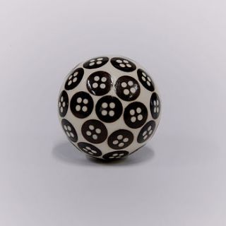 brown button resin knob by trinca ferro