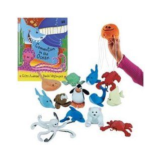 Commotion In The Ocean Book And Puppet Set: Toys & Games