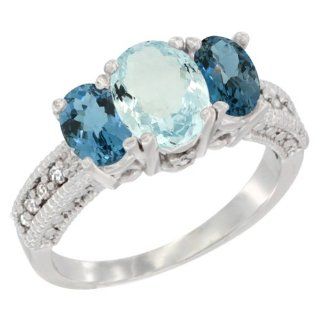 10K White Gold Ladies Oval Natural Aquamarine Ring 3 stone with London Blue Topaz Sides Diamond Accent: Jewelry
