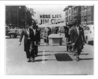 Historic Print (M) [Pallbearers with casket walking in front of sign reading here lies Jim Crow" during the  