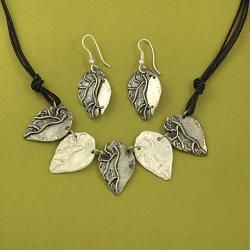 Handcrafted Pewter Two Tone Detailed Leaves Cord Necklace and Earrings Set ( India) Jewelry Sets